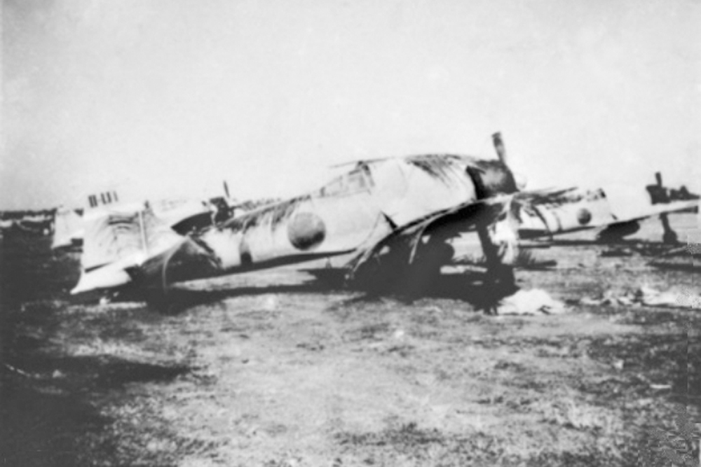 A Japanese Zero fighter aircraft sits on the runway at R.A.F. Kota Bharu airfield after its capture by the Japanese.