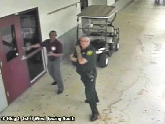 More school guards may be of limited help. Resource officer Scot Peterson (right) remained outside during the shooting at Marjory Stoneman Douglas High School. Photo Broward County Sheriff's Office.