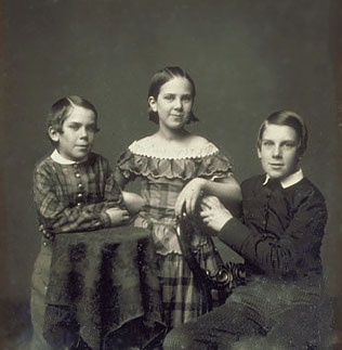 Holmes (right) and his siblings were born into the world of wealthy "Boston Brahmins," a phrase invented by their father.