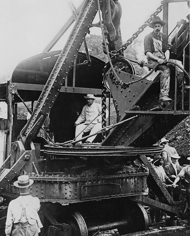 Pres. Theodore Roosevelt inspects a steam shovel in Panama during construction of the Canal in 1906.