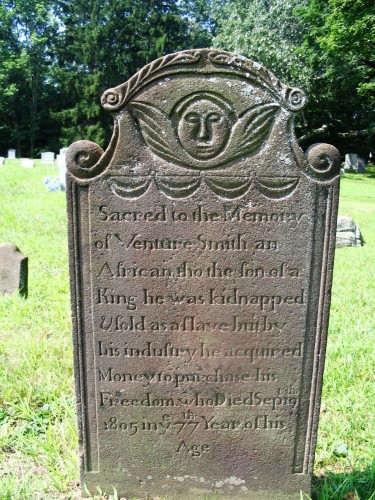 The tombstone of Venture Smith, who was abducted into slavery and bought freedom for himself and his family.