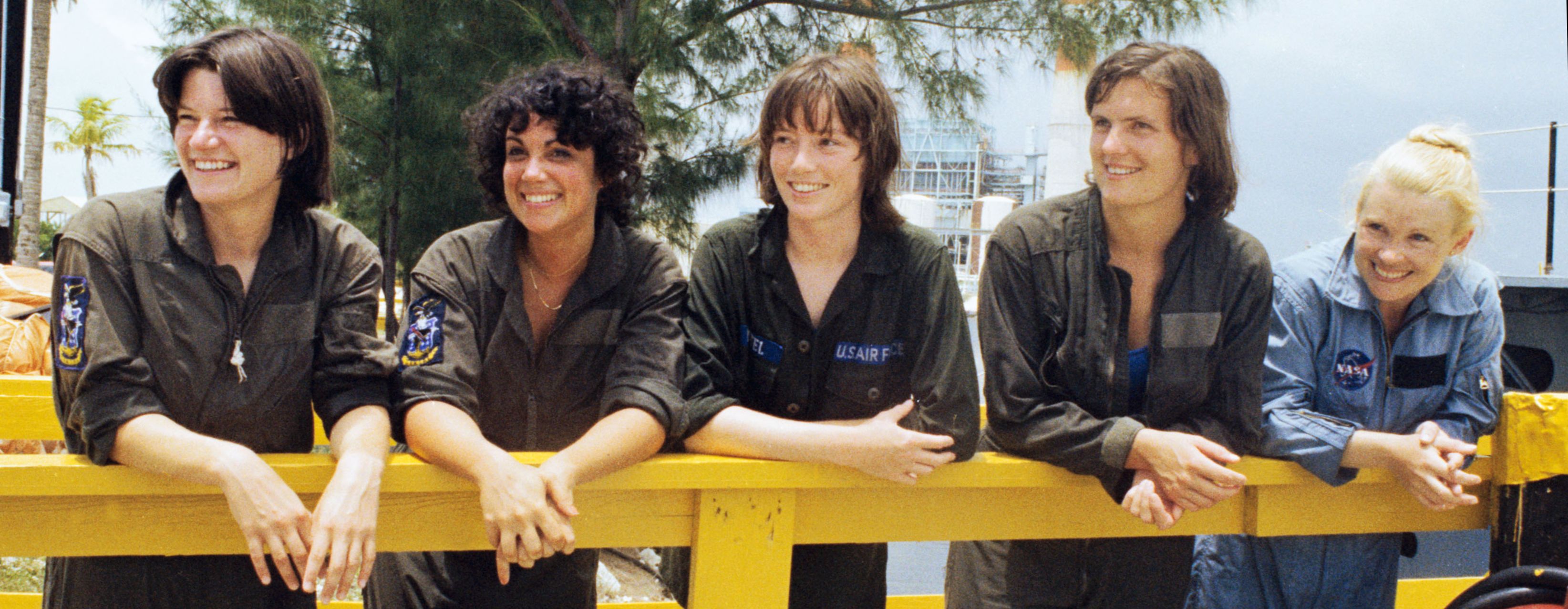 Sally Ride (left) with four other astronaut candidates took a break in during water survival training in 1978. Photo NASA.