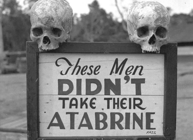 Soldiers in New Guinea fought tropical diseases such as malaria, which could be prevented by taking atabrine, as this sign warned at the 363rd Station Hospital on Papua, New Guinea during World War II.