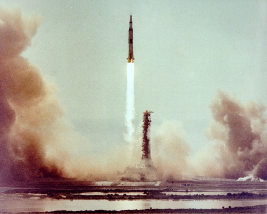 Moonbound Apollo 11 clears the launch tower