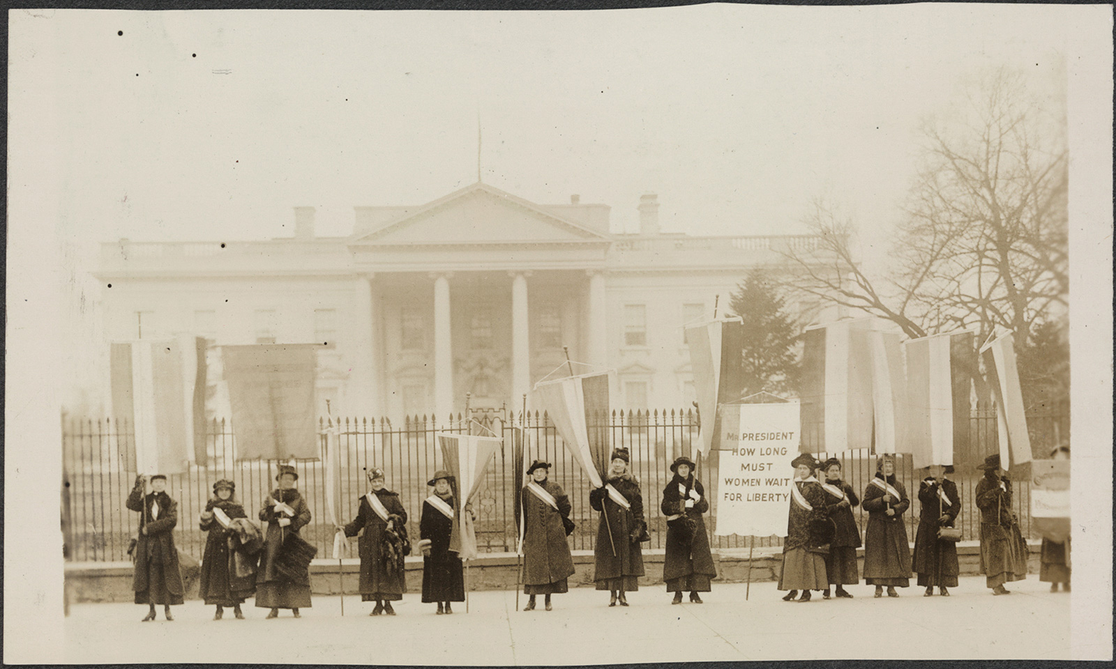 Among the first citizens to protest in front of the White House were suffragists led by Alice Paul. Library of Congress.