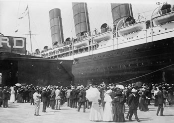 Visible from its starboard side, the Lusitania looms over admiring New Yorkers following its 1907 maiden voyage. Eight years later, the fatal U‐Boat torpedo will rip into this section of the ship’s hull.