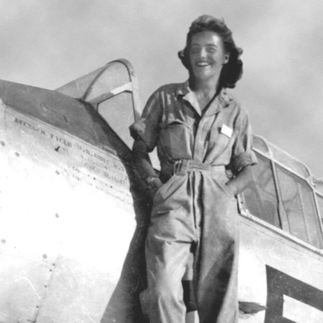 Ann Baumgartner on the wing of the AT-6 she flew during her training with the Women Airforce Service Pilots (WASP)