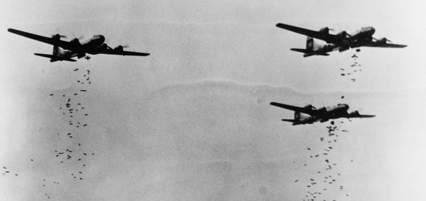 B-29s drop incendiary cluster bombs.