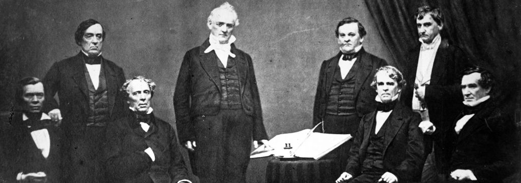 Was there treason in the cabinet of Southern-sympathizing Pres. James Buchanan (center) just before the Civil War broke out? Secretary of War John B. Floyd (at Buchanan's  right hand) transferred large amounts of Federal weaponry to armories in the South before joining the Confederate Army as a major general. Treasury Secretary Howell Cobb (to Buchanan's left) was one of the Founders of the Confederate States of America. Library of Congress.