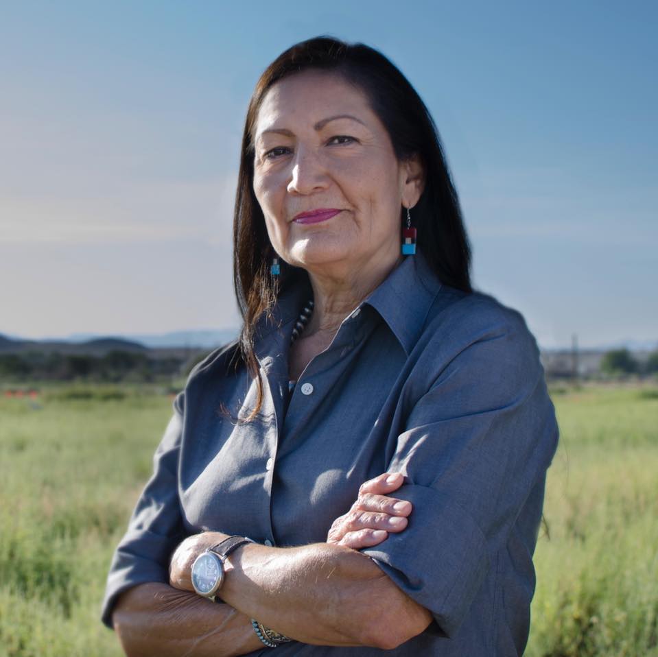 Deb Haaland, a 35th generation New Mexican, supervises the Bureau of Indian Affairs and ten other bureaus responsible for the nation’s environment, water, wildlife, and national parks and the management of 500 million acres of land. 