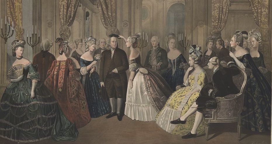 A print depicting Benjamin Franklin's reception at the court of France in 1778 shows Franklin receiving a laurel wreath on his head. From left to right, some of the members of the French court include: Duchesse Jules de Polignac, Princesse Lamballe (holding flowers), Diana Polignac (holding wreath), Comte de Vergennes, Mme Campan, Countesse de Neuilly, Marie-Antoinette (seated), Louis XVI, Princess Elizabeth. Library of Congress.