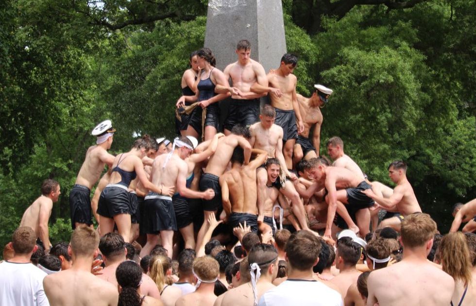 Taking place annually in May, the Herndon Climb brings together family and friends to mark the official end of the plebes' first year. 