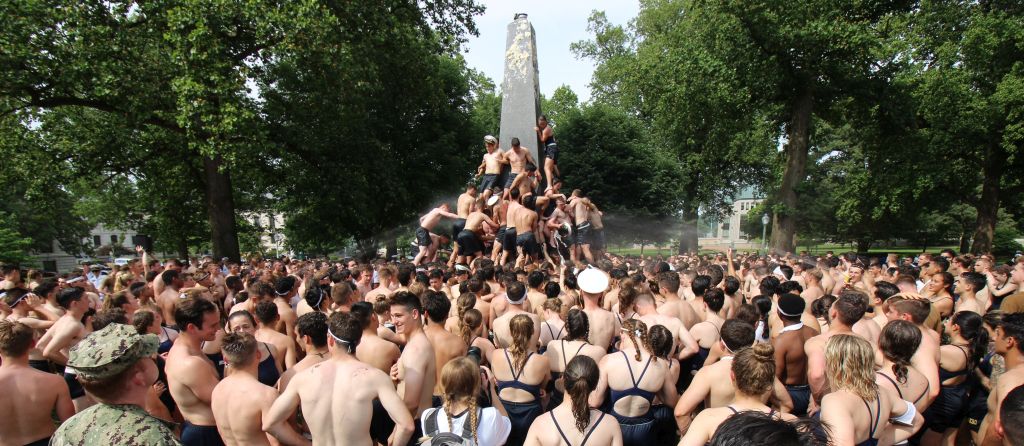 The Herndon Climb is an annual tradition at the U.S. Naval Academy during which plebe's compete to reach the top of a 21-foot, grey granite obelisk named after a 19th Century ship captain. 