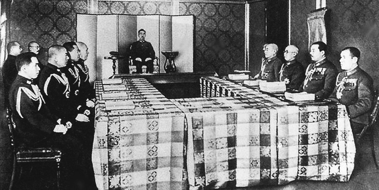 In a meeting at the e Showa Emperor Hirohito as head of the Imperial General Headquarters in 1943. Navy officers are seated left while Army officers are seated right.