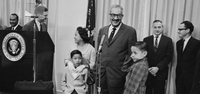 Thurgood Marshall waits in 1965 to be sworn in as Solicitor General in the Johnson Administration as his wife Cissy and sons watch. U.S. News (Library of Congress)