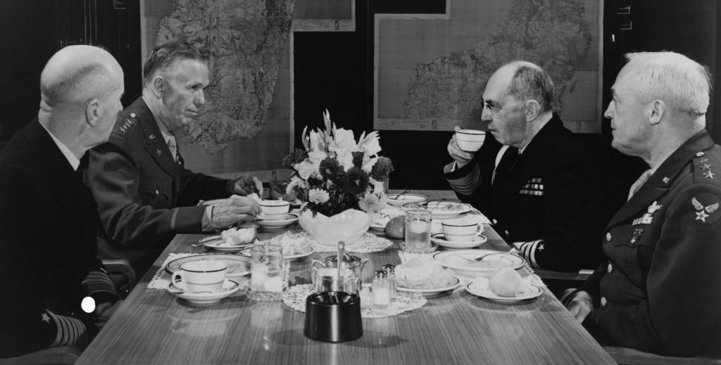 U.S. Military leaders in conference. L-R: Adm. Ernest King, Chief of Staff Gen. George Marshall, Adm. William Leahy, Air Force Chief, Gen. Hap Arnold. 1942-45. World War 2. (BSLOC_2014_8_115)