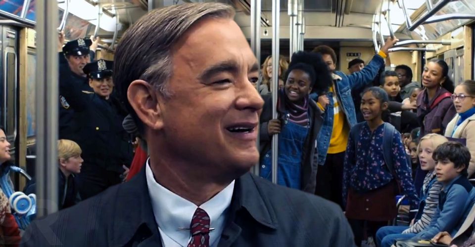 Tom Hanks played Mr. Rogers, who was surprised by a group of children spontaneously signing his theme song on a New York subway train.