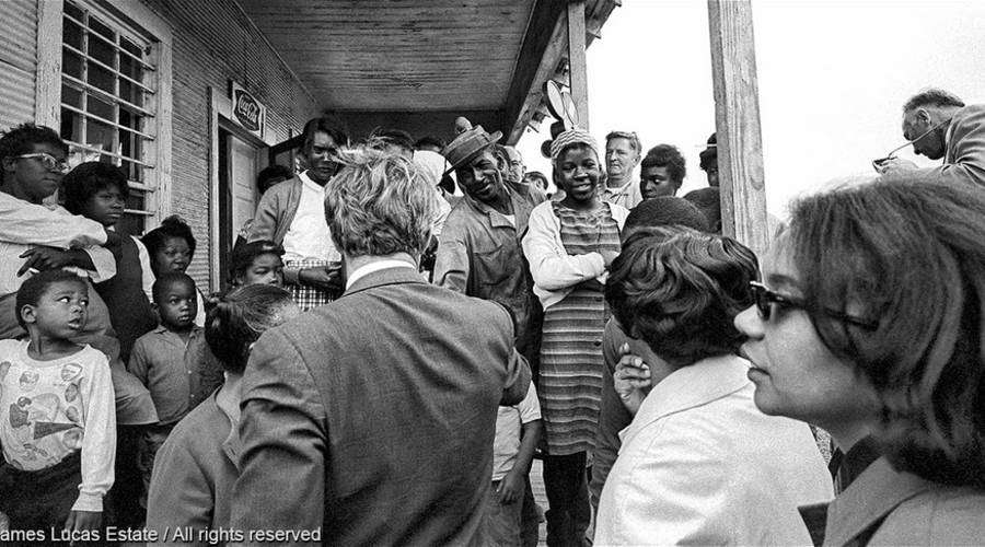 Sen. Robert Kennedy visiting a Delta family in Mississippi. Photo courtesy of Jim Lucas Estate.