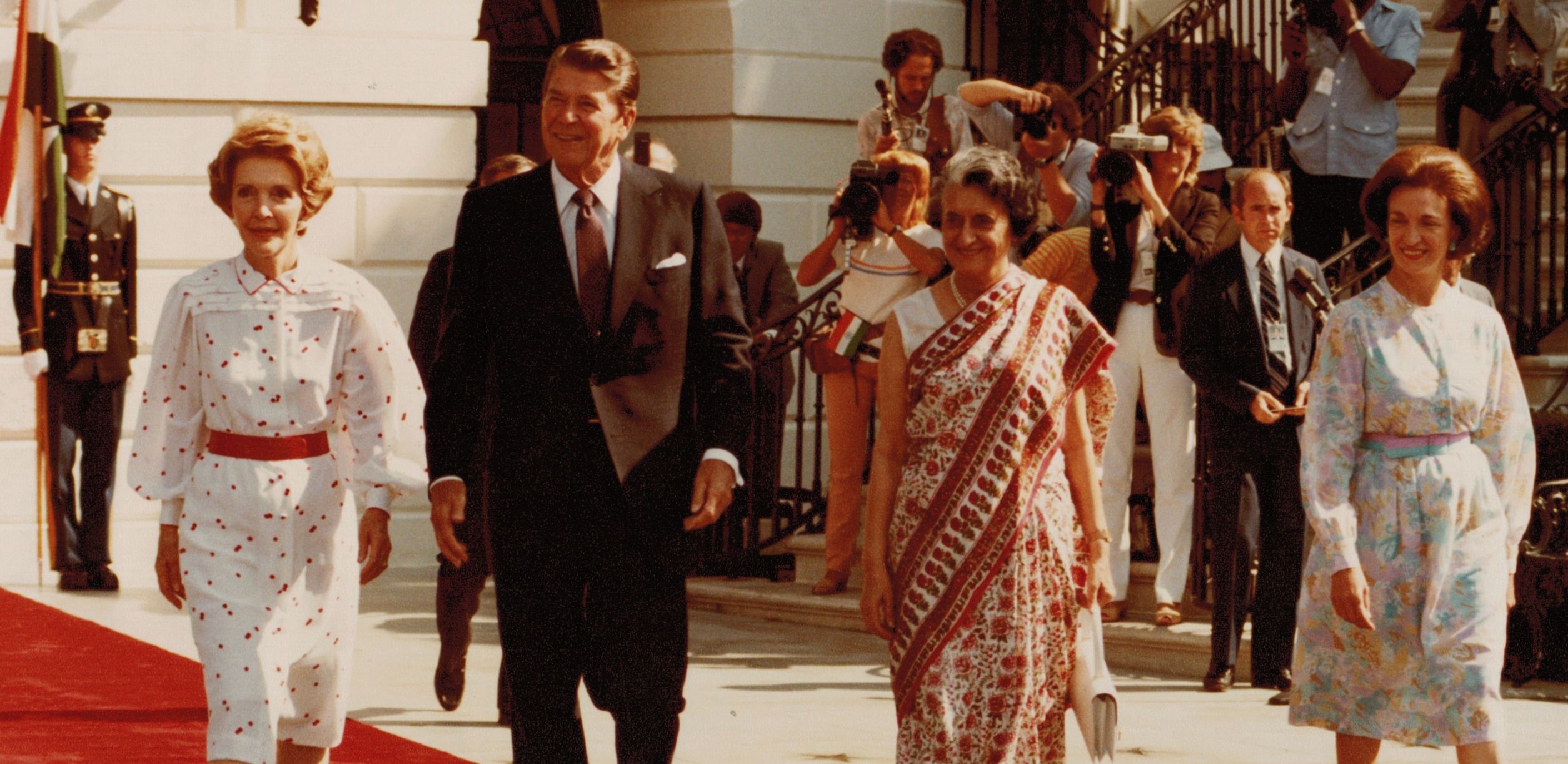 Selwa "Lucky" Roosvelt (right) helps the Reagans welcome Indian Prime Minister Indira Gandhi to the U.S. White House Photo.