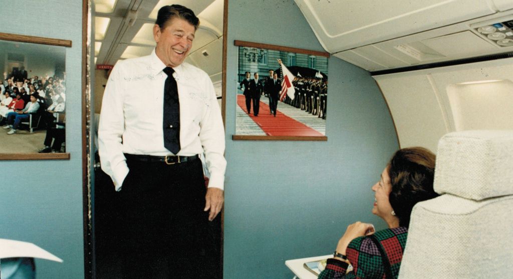 President Reagan stops to talk with the author on Air Force One.