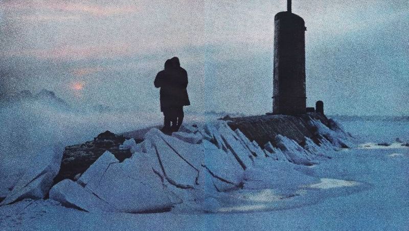 U.S.S. Skate surfaces at the North Pole in 1959. Photo by Adm. James Calvert.  US Navy photo.