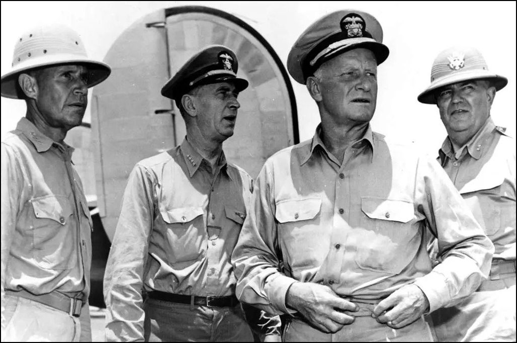 Ferocious fighting in the Pacific convinced Admirals Raymond A. Spruance, Ernest J. King, and Chester W. Nimitz, and General Sanderford Jarman (left to right here, at Saipan in 1944) that an invasion of the Japanese mainland would be a disaster. U.S. Navy