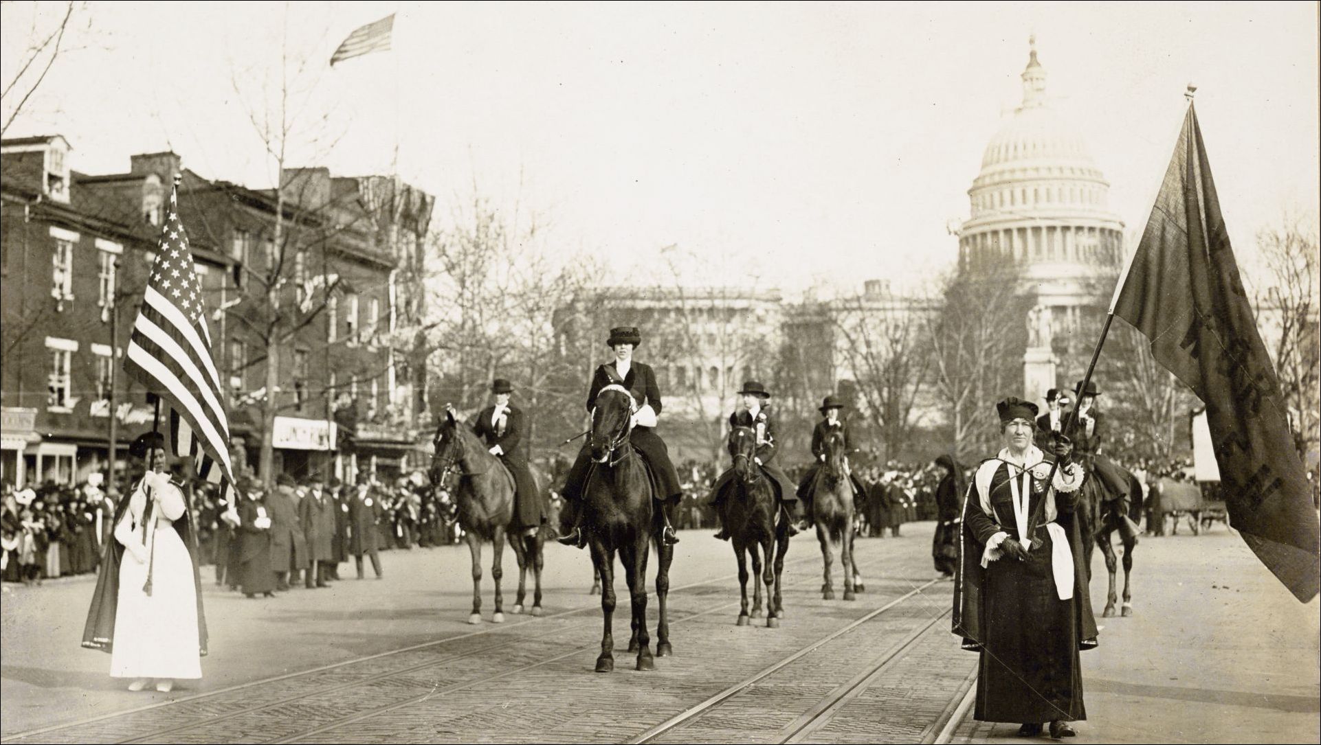 Women march down Pennsylvania from the Capitol, led by led by Mrs. Richard Coke Burleson (center on horseback). Library of Congress
