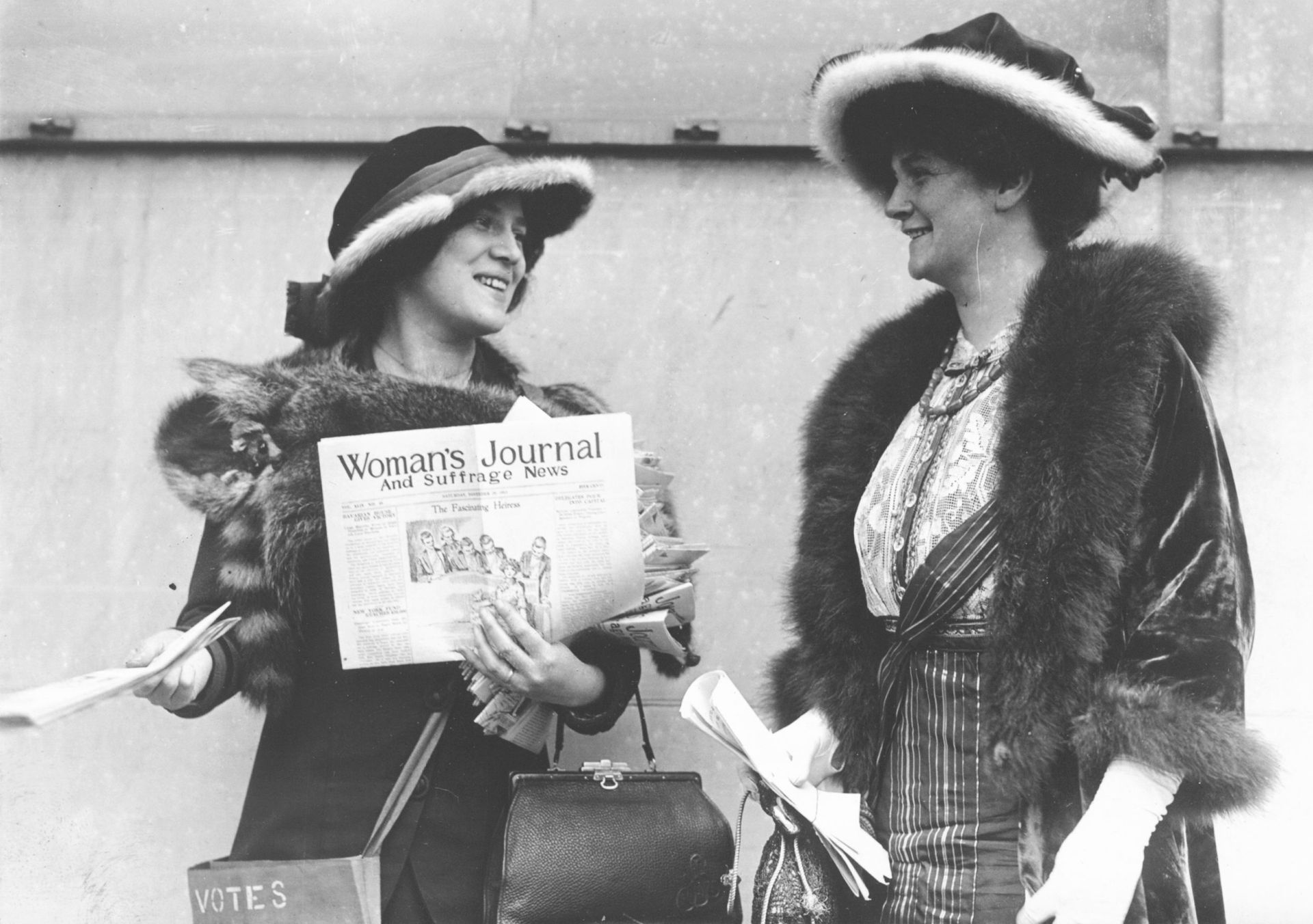 Suffragist Margaret Foley distributing the Woman's Journal and Suffrage News