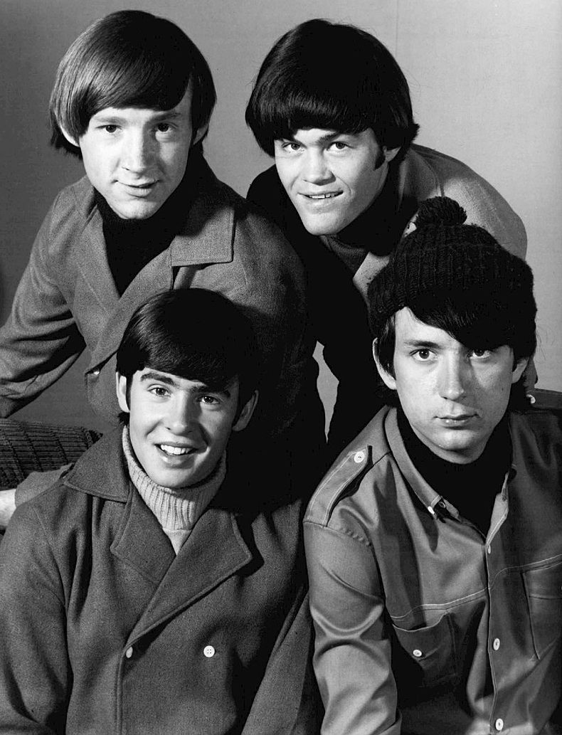 Michael Nesmith (bottom right) was photographed with the other four Monkees in 1966. NBC Television.