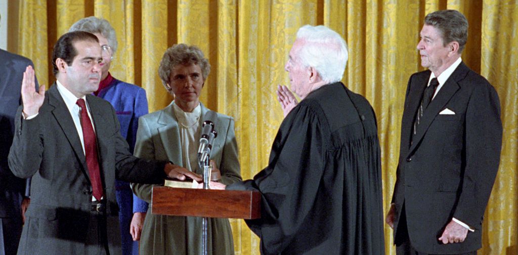 Chief Justice Warren Burger swore in Antonin Scalia as an Associate Justice of the Supreme Court in 1986 while President Reagan looked on.  After his retirement, the conservative Burger stated that the Second Amendment "has been the subject of one of the greatest pieces of fraud, I repeat the word 'fraud,' on the American public by special interest groups."