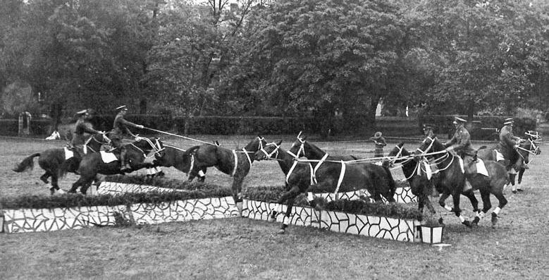 The U.S. cavalry demonstrates horsemanship skills at Fort Myer in 1935.