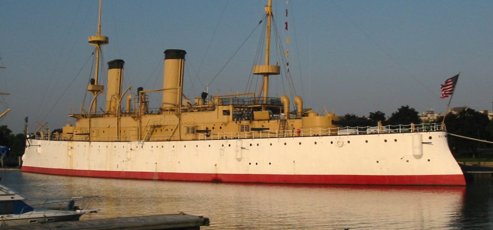 The International Seaport preserves the USS Olympia, a steam-powered cruiser that served as the flagship of Commodore George Dewey at the Battle of Manila Bay during the Spanish–American War in 1898. During World War I the ship patrolled the American coast, served as a training ship and later participated in the 1919 Allied intervention in the Russian Civil War. Photo by George100/Wikipedia.