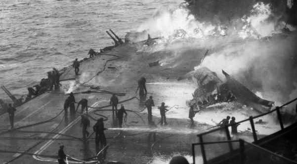 The American carrier USS Saratoga was nearly sunk by kamikaze attacks on February 21, 1945